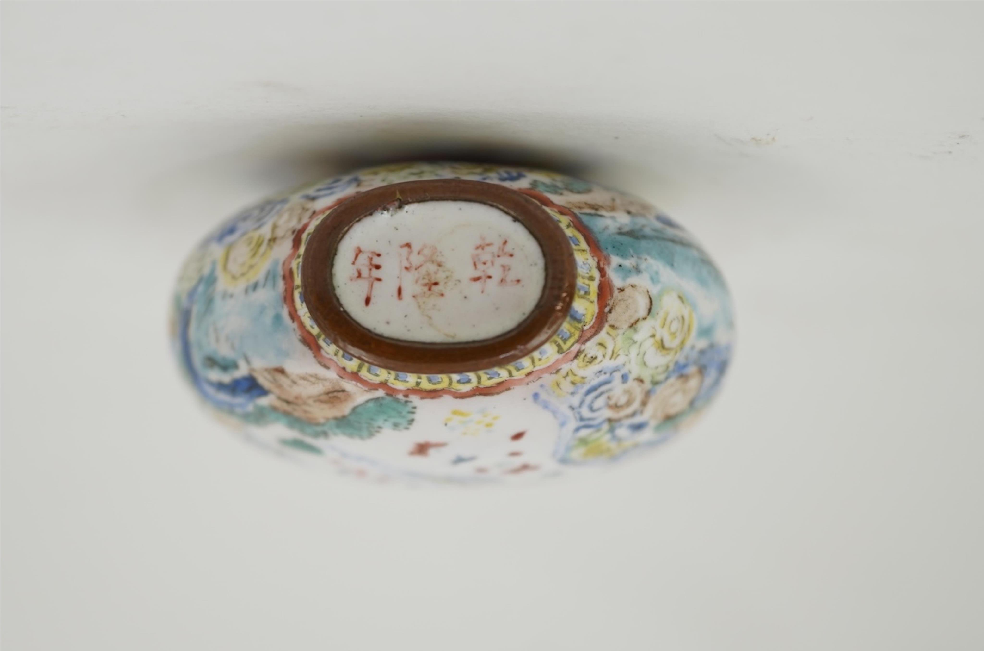 A Chinese Guangzhou enamel snuff bottle, Qianlong mark, 19th century